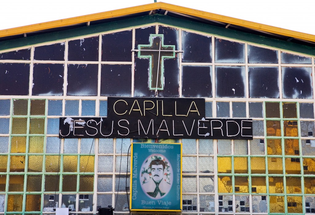 Detail of the facade of the chapel of Saint Jesus Malverde, a bandit of the XVIII century turned into the "saint of the drug dealers" by the people in Culiacan, Sinaloa state, Mexico on June 2, 2008. Mexico is being whipped by a war among drug cartels disputing their place and the trafficking to the United States with unusual ferocity and sophisticated arms on June 11, 2008. Executed, beheaded, tied and tortured bodies with messages against rival bands, or threatened police and street announcements are part of the geography of violence in several states of Mexico. In the course of the year, there were at least 1,378 deaths, 47% more than in the same period in 2007. AFP PHOTO/LUIS ACOSTA